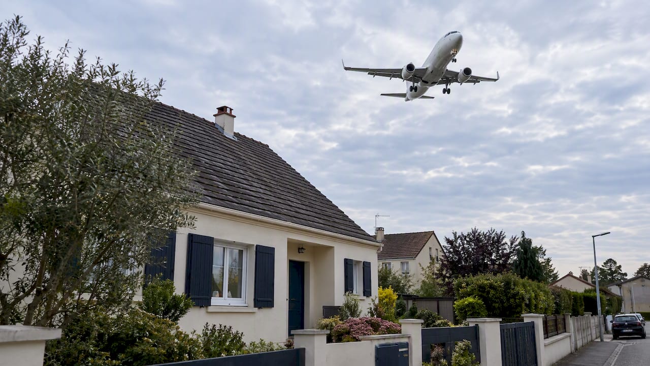 Maison d’habitation située sous le trajet d’un avion